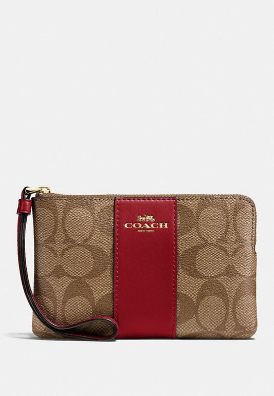 Coach Corner Zip Wristlet In Signature Canvas