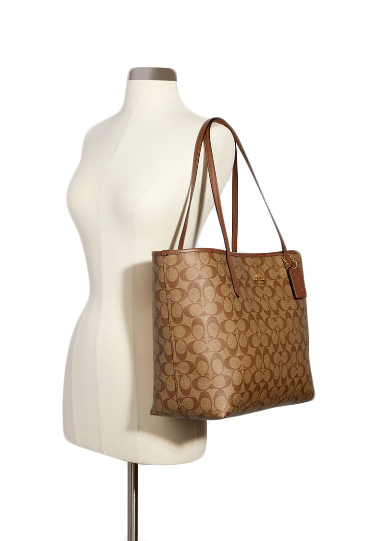 Coach City Tote In Signature Canvas - Brown