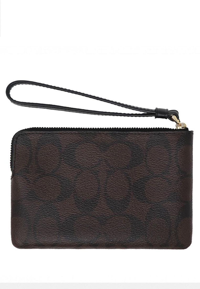 Coach Corner Zip Wristlet In Signature Canvas - Dark Brown