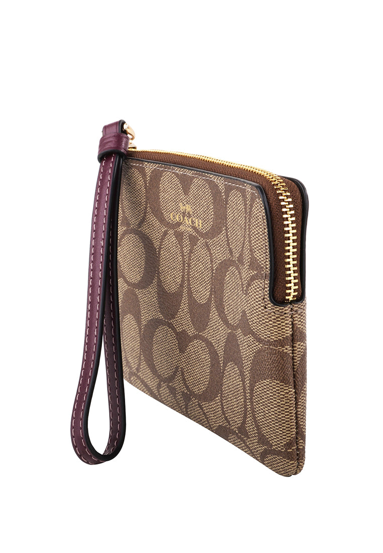 Coach Corner Zip Wristlet In Signature Canvas - Brown/Deep Berry