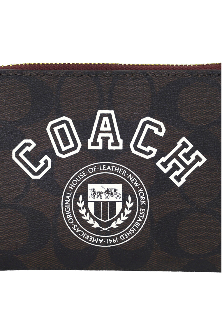 Coach Corner Zip Wristlet In Signature Canvas With Varsity Motif - Dark Brown/White